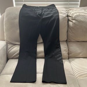 New Express Columnist, side pockets, zip & double hook closure.Flares at bottom.